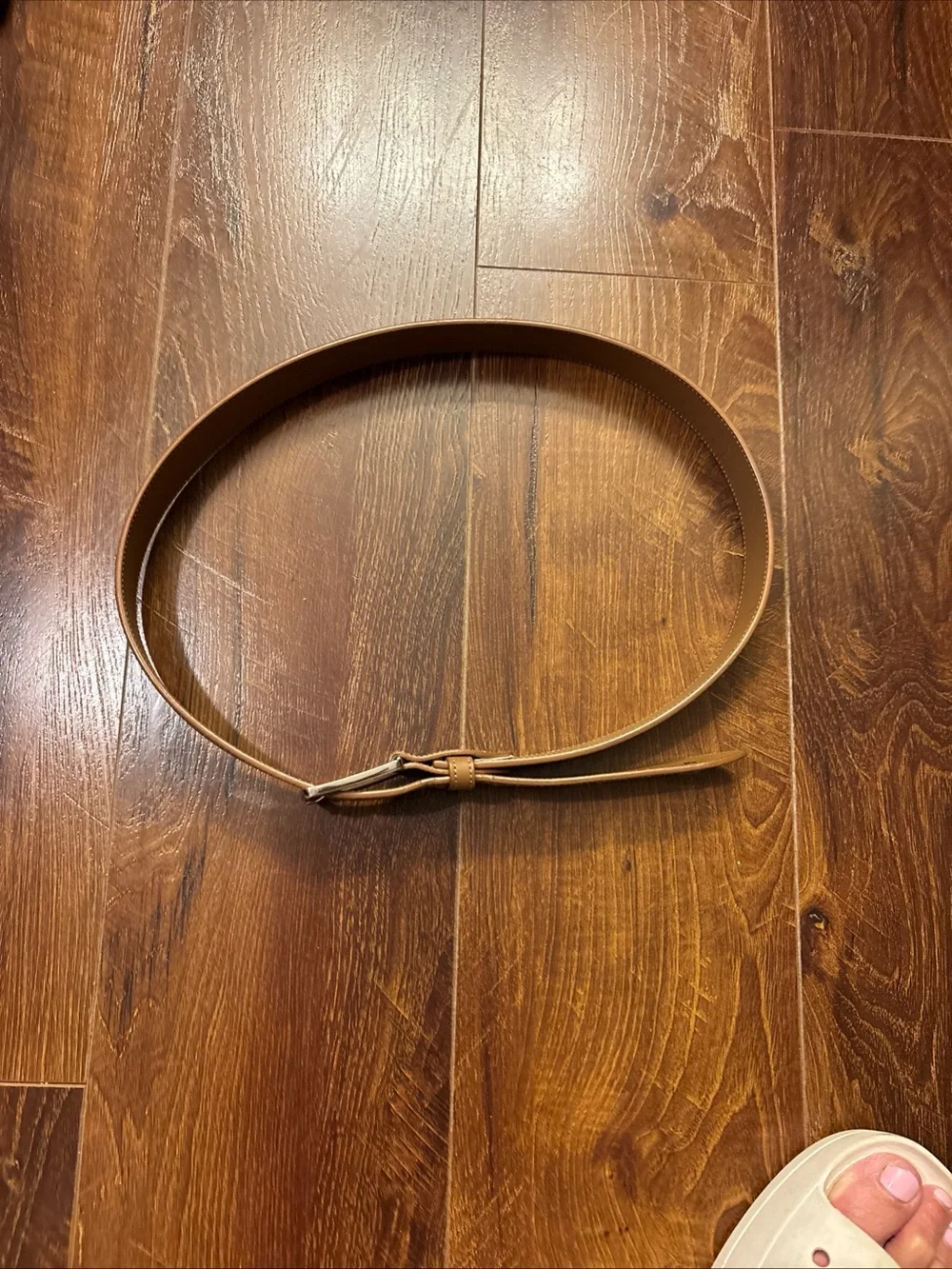 Tan Lacoste belt with textured weave pattern size 36